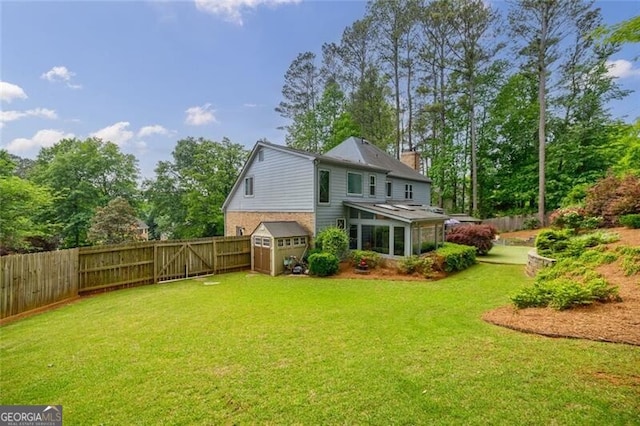 3389 Robinson Farms Trce NE, Marietta, GA 30068 - back of property featuring a storage shed, an outbuilding, and an attached garage