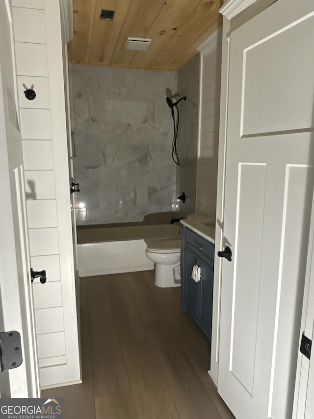 full bathroom featuring wood ceiling, wood finished floors, vanity, toilet, and tub / shower combination