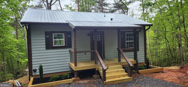 view of front of property featuring metal roof