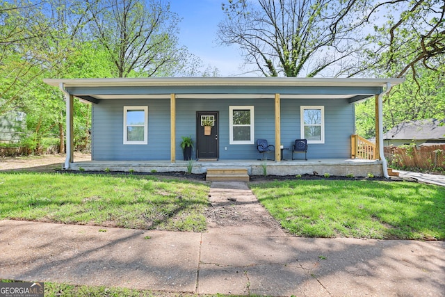 view of front of home featuring a porch and a front yard