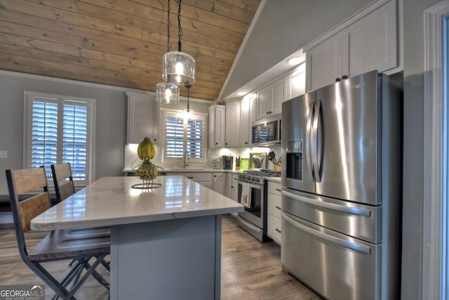 20 Mohawk Trl, Ellijay, GA 30540 - kitchen with a kitchen island, light wood-style floors, wood ceiling, appliances with stainless steel finishes, and vaulted ceiling