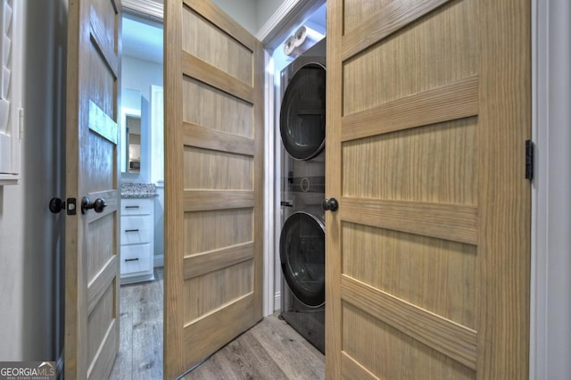20 Mohawk Trl, Ellijay, GA 30540 - laundry room with laundry area, light wood-style flooring, and stacked washer / dryer