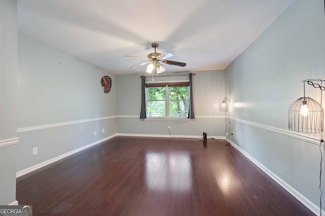 1007 Natalie Ln SE, Smyrna, GA 30082 - spare room featuring a ceiling fan, baseboards, and wood finished floors