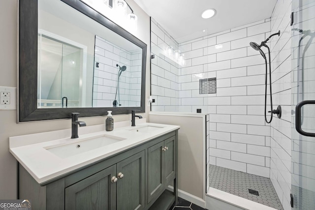 1007 Natalie Ln SE, Smyrna, GA 30082 - bathroom with double vanity, recessed lighting, a shower stall, and a sink