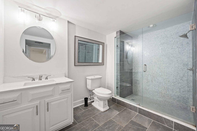 1007 Natalie Ln SE, Smyrna, GA 30082 - bathroom with vanity, baseboards, a shower stall, and toilet