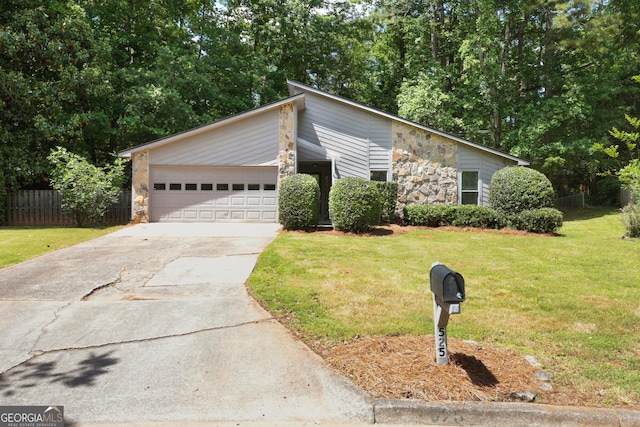 mid-century inspired home with stone siding, concrete driveway, and an attached garage