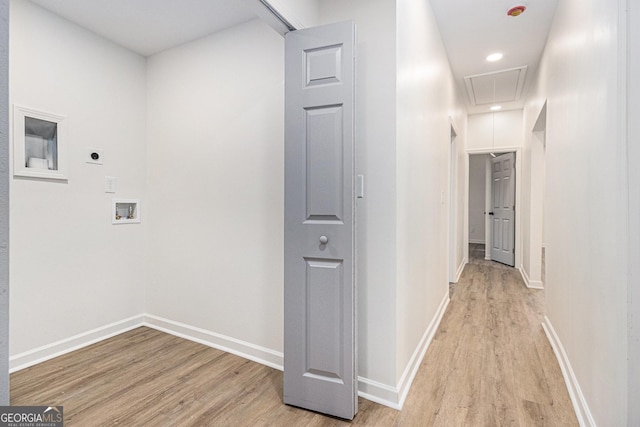 corridor featuring light wood-style floors, baseboards, attic access, and recessed lighting