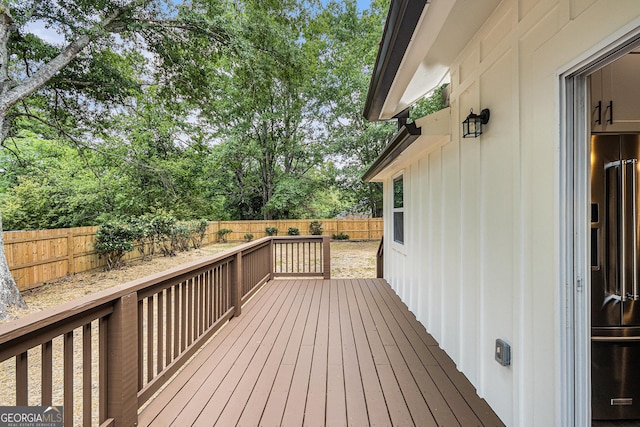 deck featuring a fenced backyard