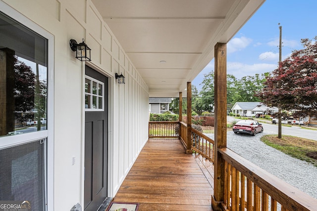 deck with covered porch