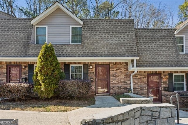 3135 Reeves St SE, Smyrna, GA 30080 - view of front of house with brick siding and a shingled roof