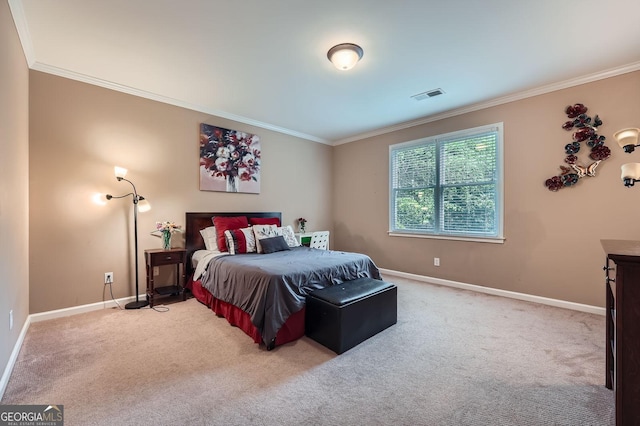 carpeted bedroom with crown molding, baseboards, and visible vents