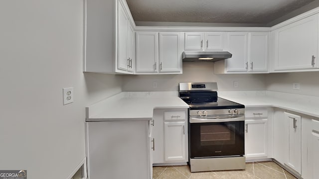 943 Colvin Dr, Locust Grove, GA 30248 - kitchen featuring stainless steel electric stove, white cabinets, and under cabinet range hood