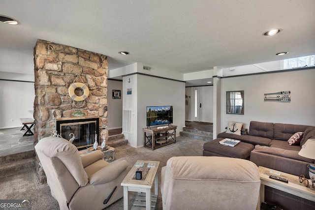 202 Providence Villas, Anderson, SC 29626 - carpeted living room with recessed lighting, a textured ceiling, visible vents, and a stone fireplace