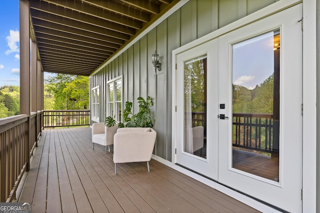 wooden terrace featuring french doors