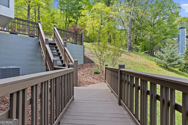 wooden terrace featuring central AC and stairs