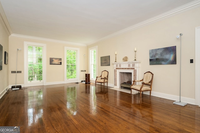 1464 Twin Pines Dr, Macon, GA 31211 - living area featuring crown molding, a premium fireplace, baseboards, and wood finished floors
