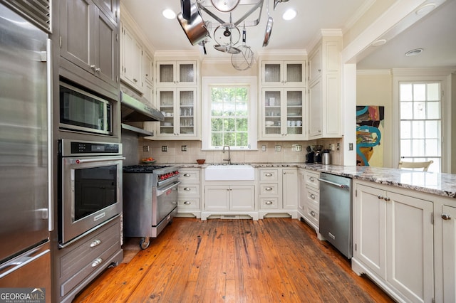 1464 Twin Pines Dr, Macon, GA 31211 - kitchen featuring crown molding, a sink, built in appliances, and a chandelier