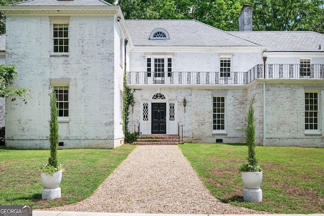 1464 Twin Pines Dr, Macon, GA 31211 - french country inspired facade featuring a chimney, a front lawn, a balcony, and crawl space