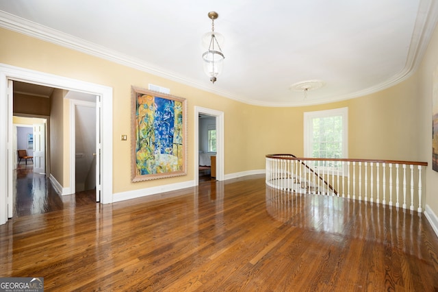 1464 Twin Pines Dr, Macon, GA 31211 - unfurnished room featuring crown molding, baseboards, and wood finished floors