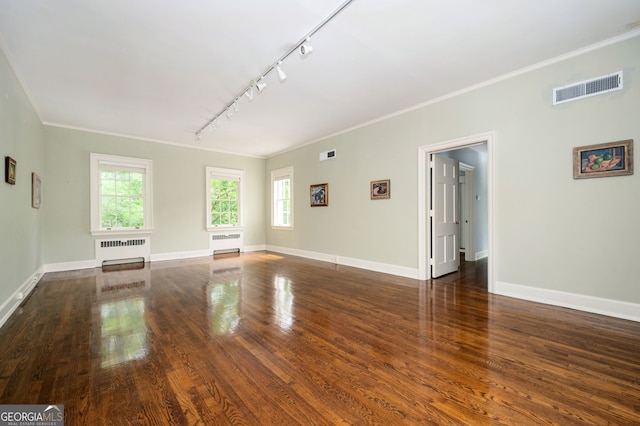 1464 Twin Pines Dr, Macon, GA 31211 - unfurnished living room featuring ornamental molding, visible vents, track lighting, and radiator heating unit