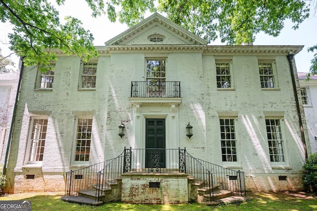 1464 Twin Pines Dr, Macon, GA 31211 - view of front of home featuring brick siding, crawl space, and a balcony