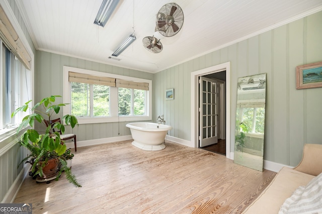 1464 Twin Pines Dr, Macon, GA 31211 - bathroom with visible vents, a freestanding tub, wood finished floors, baseboards, and ornamental molding