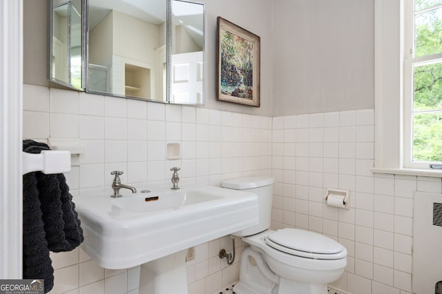 1464 Twin Pines Dr, Macon, GA 31211 - bathroom featuring toilet and tile walls