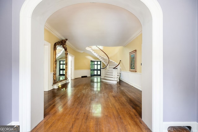 1464 Twin Pines Dr, Macon, GA 31211 - interior space featuring arched walkways, wood finished floors, stairway, and ornamental molding