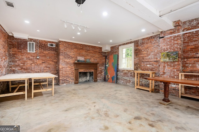 1464 Twin Pines Dr, Macon, GA 31211 - unfurnished living room with ornamental molding, a fireplace, concrete floors, and visible vents