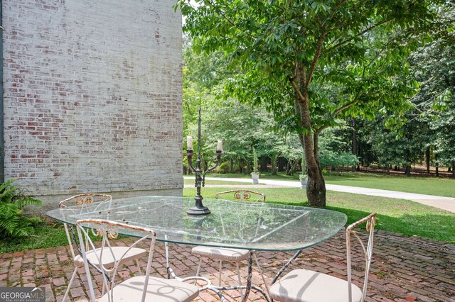 1464 Twin Pines Dr, Macon, GA 31211 - view of patio with outdoor dining space