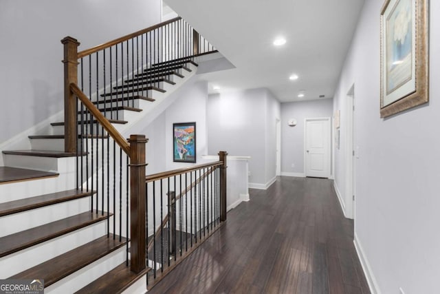 interior space with recessed lighting, baseboards, and wood finished floors