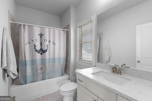 full bathroom with vanity, toilet, and shower / tub combo with curtain