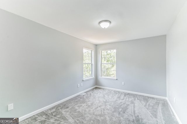 5452 Sweetsprings Dr SW, Powder Springs, GA 30127 - spare room with baseboards, carpet, and visible vents