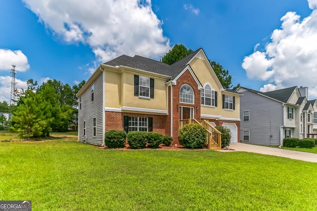 5452 Sweetsprings Dr SW, Powder Springs, GA 30127 - view of front facade with stucco siding, concrete driveway, a front yard, and brick siding
