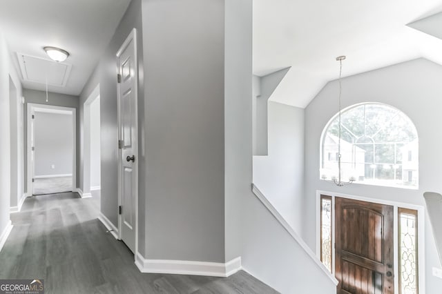 5452 Sweetsprings Dr SW, Powder Springs, GA 30127 - entrance foyer with baseboards, dark wood-style flooring, and an inviting chandelier