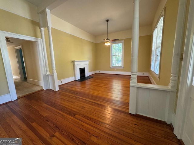 589 Meigs St, Athens, GA 30601 - unfurnished living room featuring ceiling fan, a fireplace with flush hearth, baseboards, and hardwood / wood-style flooring