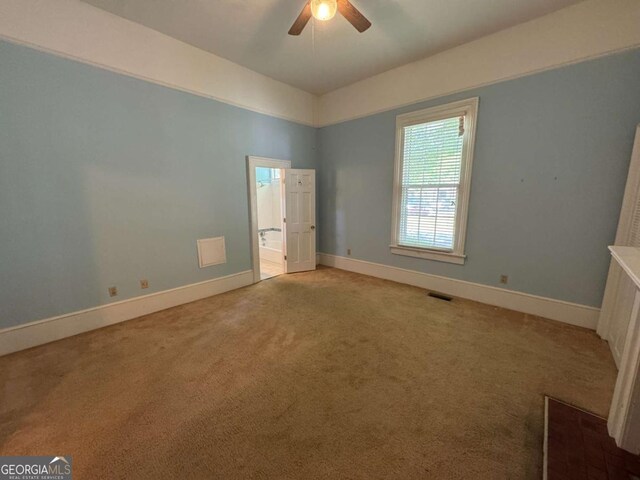 589 Meigs St, Athens, GA 30601 - unfurnished bedroom with visible vents, baseboards, ceiling fan, carpet flooring, and ensuite bath