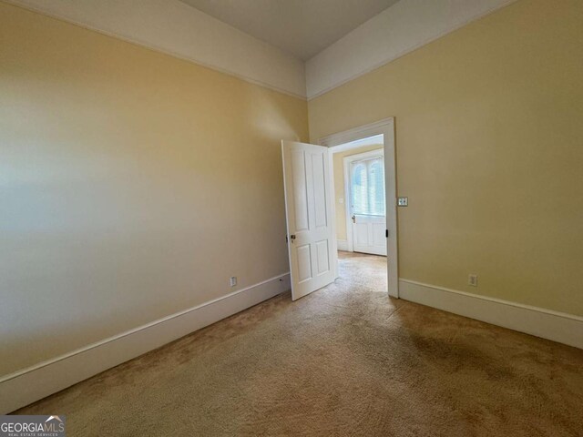 589 Meigs St, Athens, GA 30601 - spare room featuring baseboards and carpet