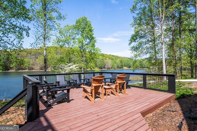 321 Fausetts Lake Rd, Dawsonville, GA 30534 - wooden deck with a view of trees and a water view