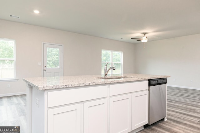 kitchen featuring visible vents, ceiling fan, a sink, light wood-style flooring, and dishwasher