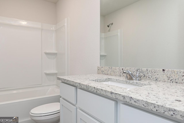 full bathroom featuring vanity,  shower combination, and toilet