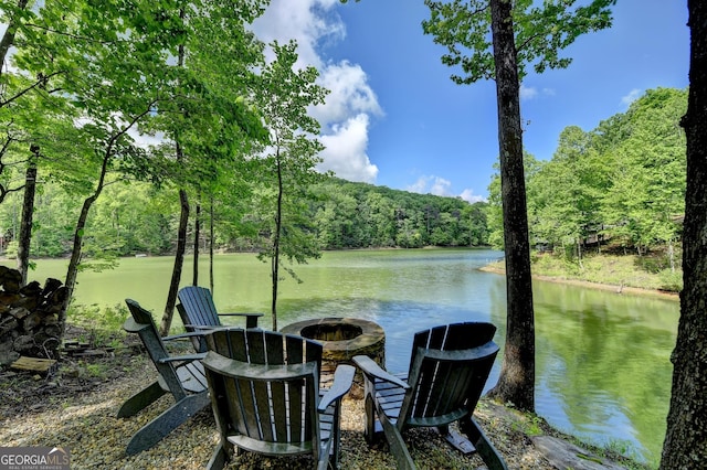 676 N Shore Dr, Cleveland, GA 30528 - dock area featuring a fire pit, a water view, and a wooded view