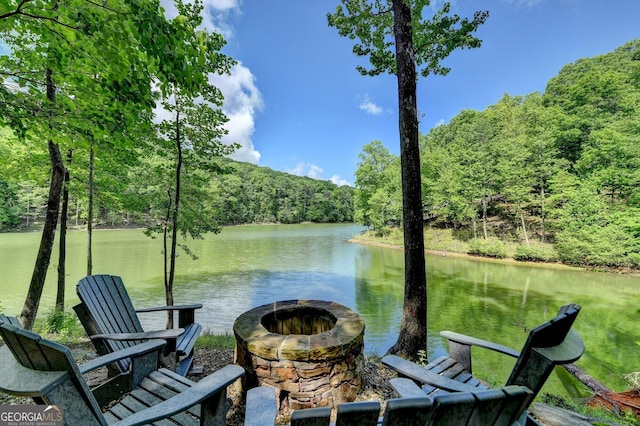 676 N Shore Dr, Cleveland, GA 30528 - dock area with an outdoor fire pit, a water view, and a forest view
