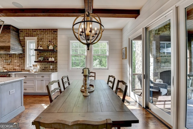 676 N Shore Dr, Cleveland, GA 30528 - dining area featuring beamed ceiling, a chandelier, and dark wood-style floors