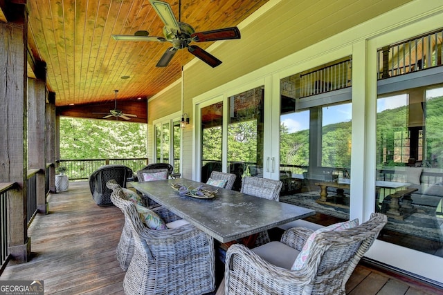 676 N Shore Dr, Cleveland, GA 30528 - wooden deck with french doors, ceiling fan, and outdoor dining space
