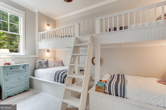 carpeted bedroom featuring ornamental molding