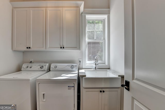 676 N Shore Dr, Cleveland, GA 30528 - laundry room with cabinet space and washing machine and clothes dryer