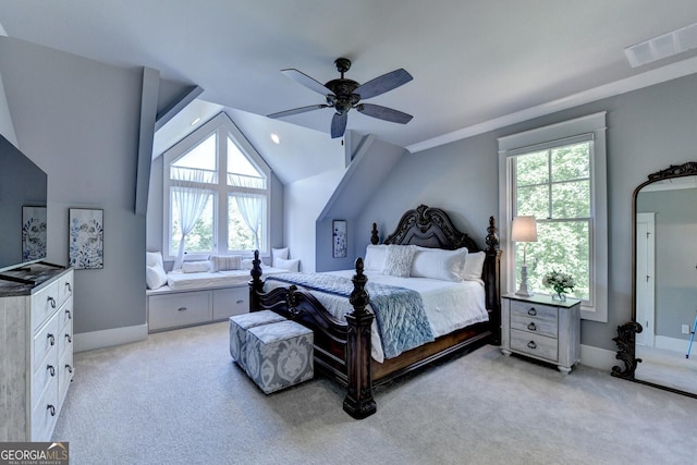 676 N Shore Dr, Cleveland, GA 30528 - bedroom featuring multiple windows, light colored carpet, lofted ceiling, a ceiling fan, and baseboards