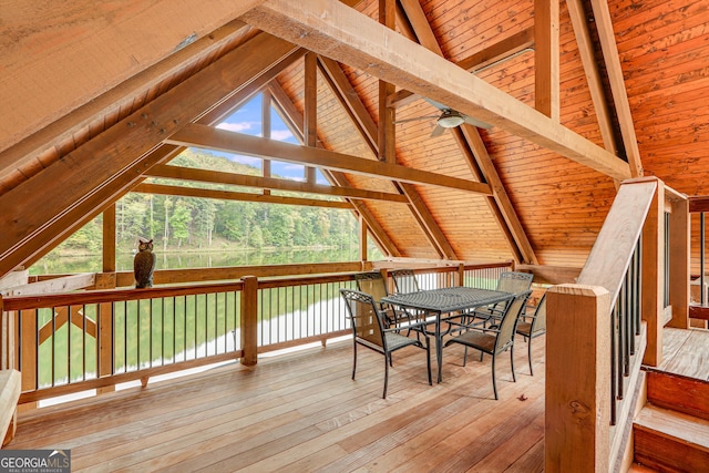 interior space with lofted ceiling with beams, wood ceiling, and hardwood / wood-style flooring