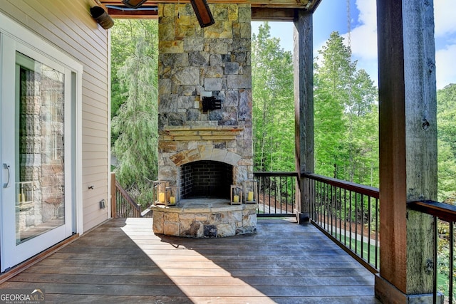676 N Shore Dr, Cleveland, GA 30528 - wooden terrace featuring an outdoor stone fireplace